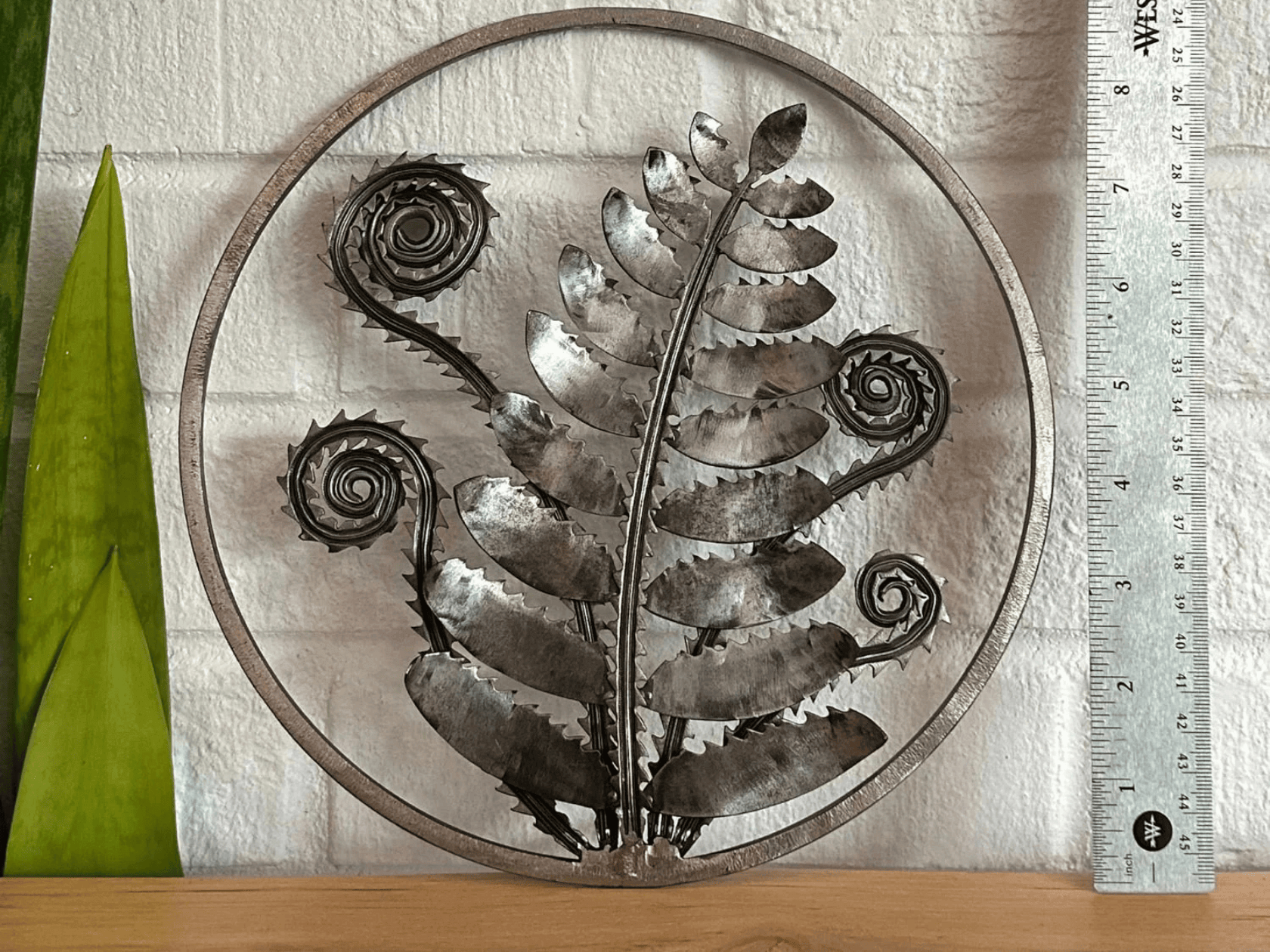 Handcrafted Metal wall art of a fern and vines