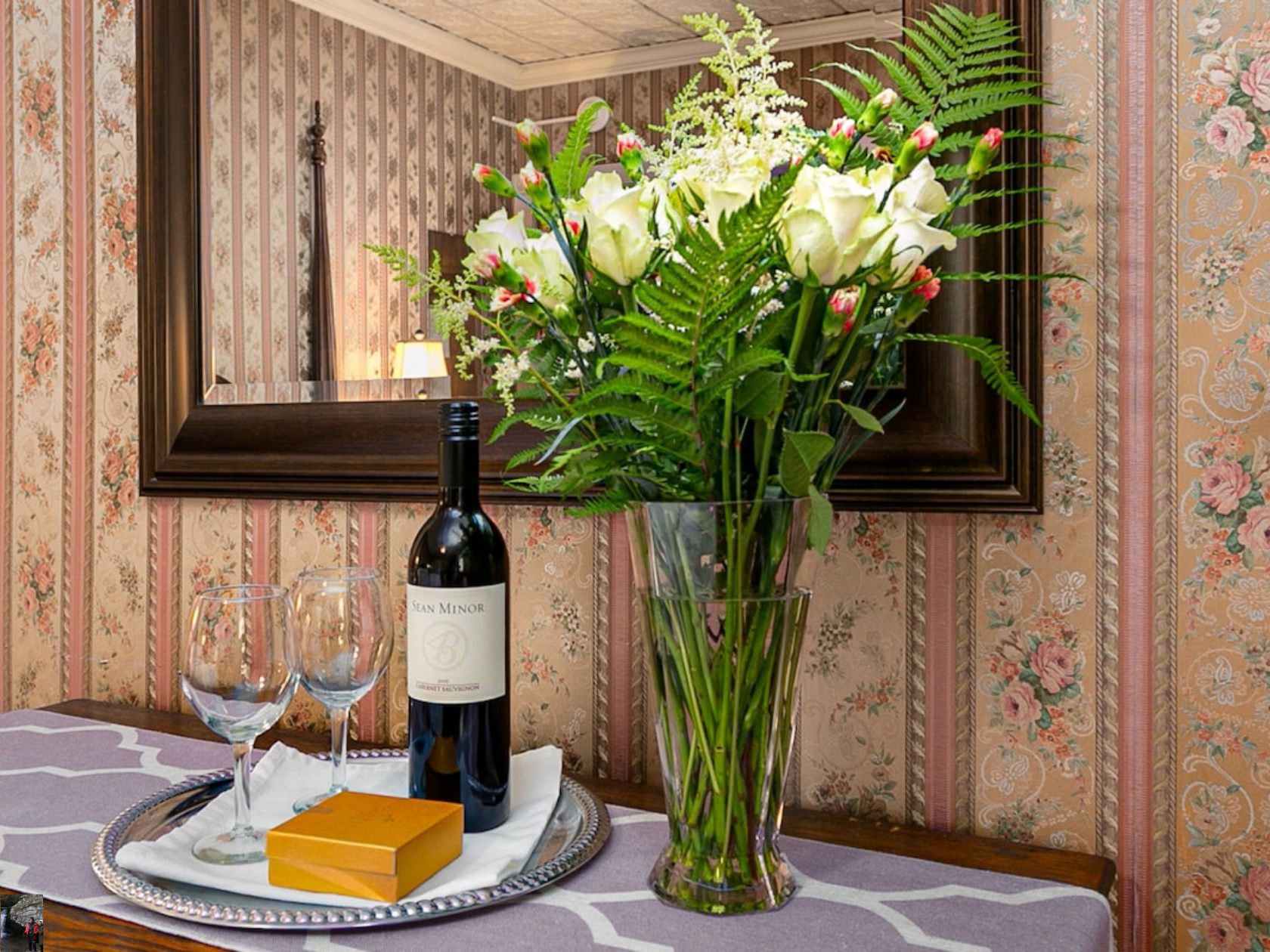 A couple holding each other close in a snowy scene