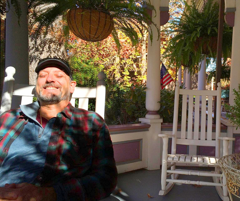 A father basking in the sun and relaxing